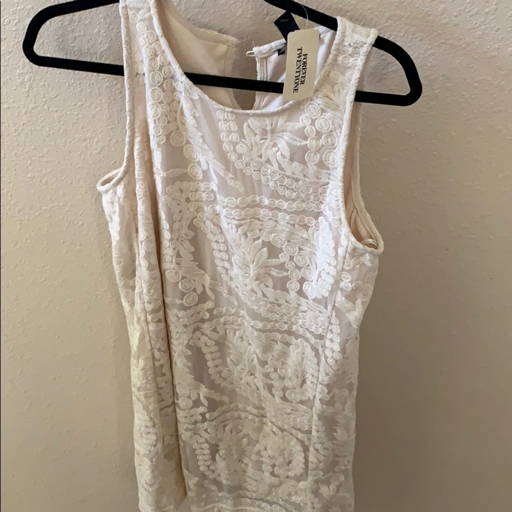 cream dress with beautiful detail